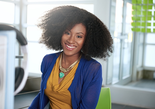 business woman smiling at the camera