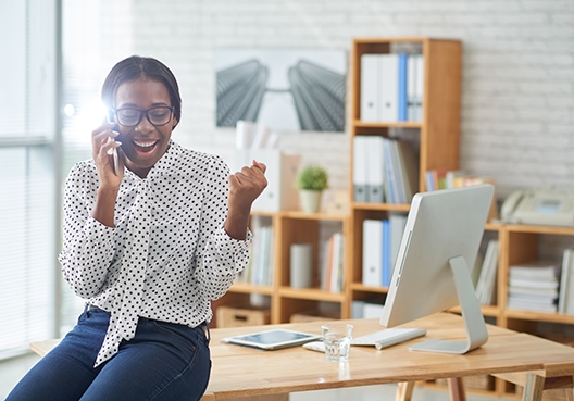 lady laughing, talking on her phone