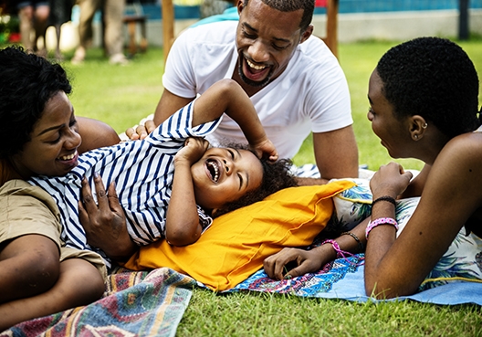 family picnicing on the park